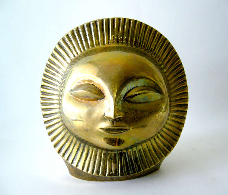 A brass sunhead sculpture possibly created by Paul Bellardo of Palm Springs, California.  Sculpture measures 12