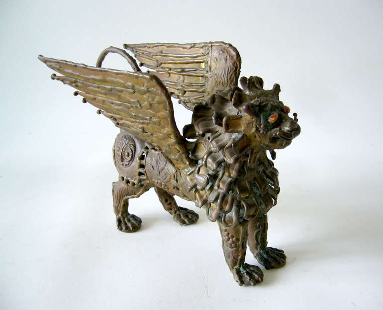Handmade bronze Griffin sculpture with glass eyes created by Pal Kepenyes of Acapulco, Mexico. Kepenyes was born in Hungary and emigrated to Mexico in the 1960s and is known for his over the top surrealist designs. In Greek mythology, the Griffin