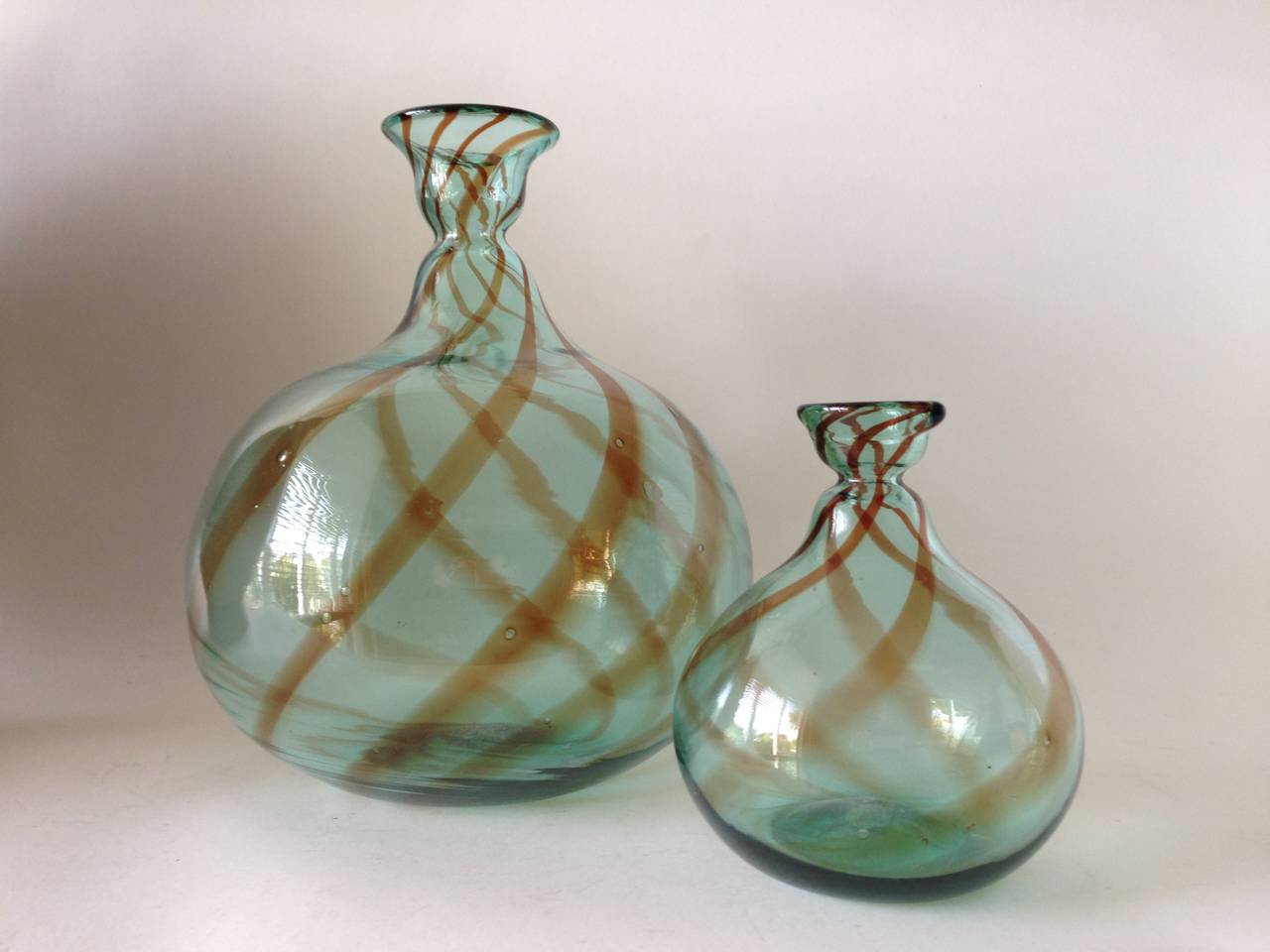 Two balloon vases designed by Donald Shepherd for Blenko, circa 1982. Large vase measures 11.5