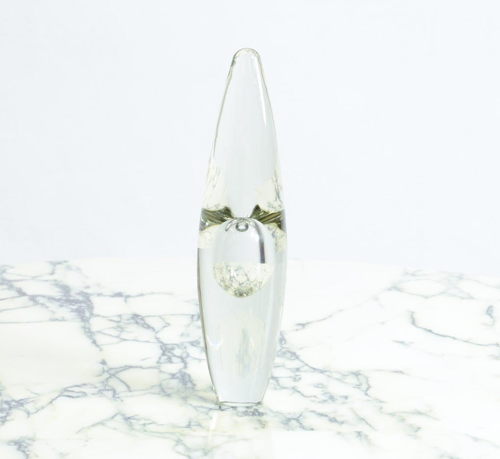 This large clear glass orchid vase was designed by Timo Sarpaneva in 1953 for Iittala, Finland.
Timo Sarpaneva was an influential Finnish designer and sculptor, best known in the art world for innovative work in glass.
Sarpaneva’s first