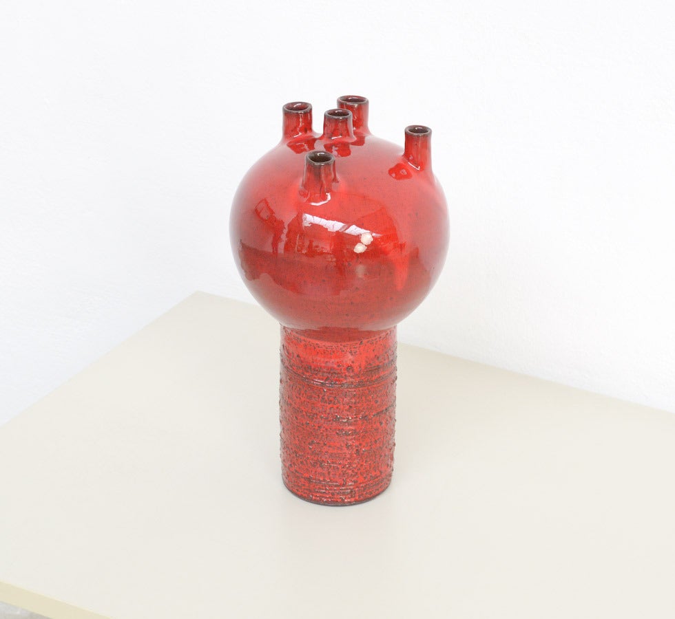This unique and elegant deep red vase was made by Keramar, Bruges and signed MK.
Keramar was a ceramics workshop, founded in the early 1960s. Untill the present it is still unknown who was the artist behind this studio. Most of their production was
