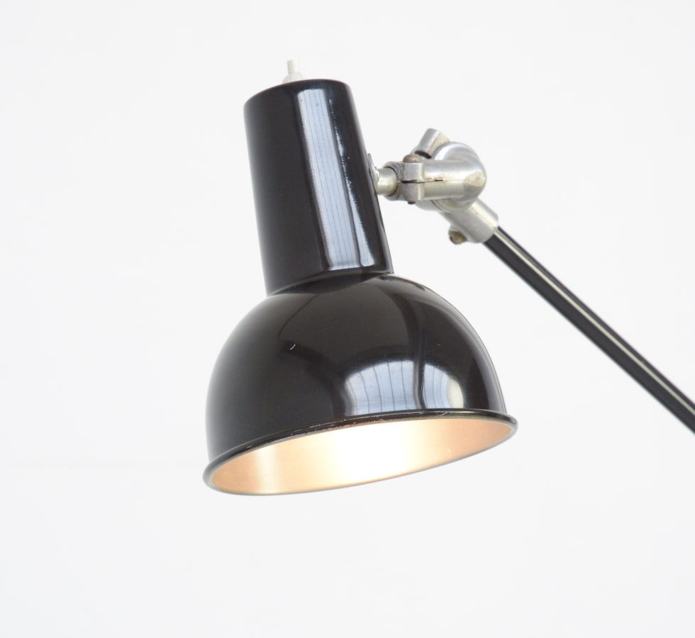 This great architect desk lamp is made in the 1940s. It is pure: The black powder coated shade and stems in combination with the ingenious aluminium joints.
The lamp has to be fixed on the desk.
This nice piece of industrial design is in very good