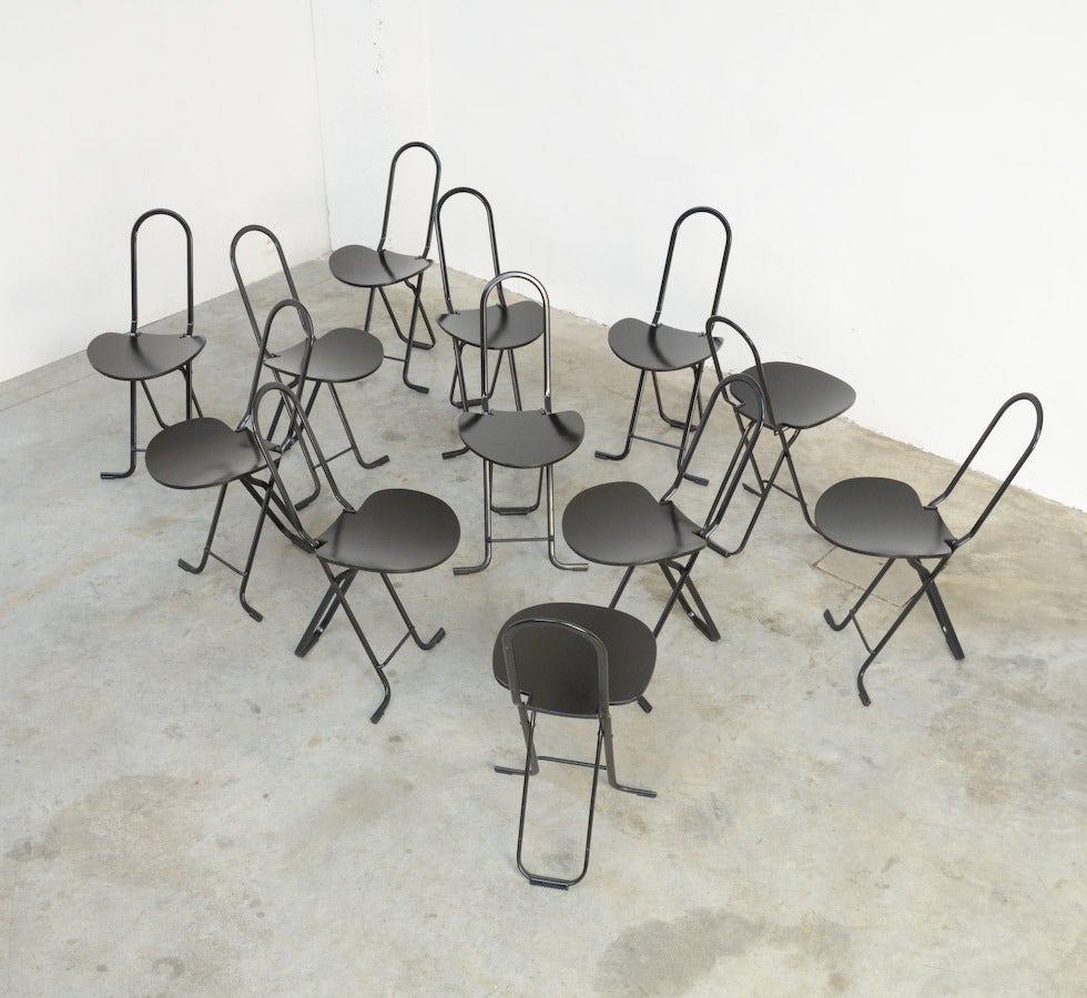 The practical Dafne folding chair was designed by Gastone Rinaldi for Thema Italy in 1979.
These chairs made of black lacquered tubular steel and moulded plywood.
The chairs are in very good vintage condition, with some signs of age and use. Some