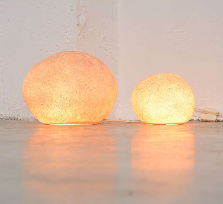 The rock shaped lamp Dorra was designed by Andre Cazenave in 1969.
It is made of resin with marble powder on a round white plastic base.
This nice set of two lamps is in excellent condition, but not marked. 

Height: 24