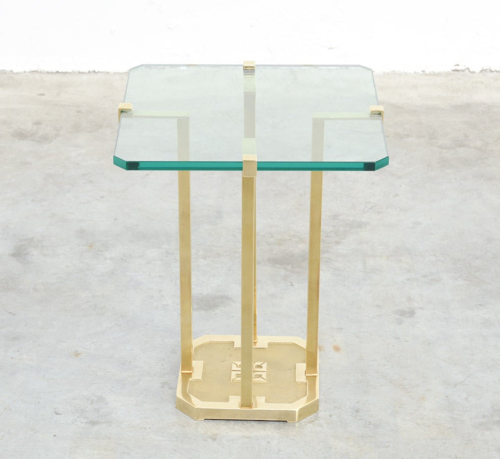 This lovely brass and glass side table is designed by Peter Ghyczy in the early 1970s in the Netherlands.
Born in Budapest, Peter Ghyczy started his career as an architect in Germany. He has been living in the Netherlands for many years  and this