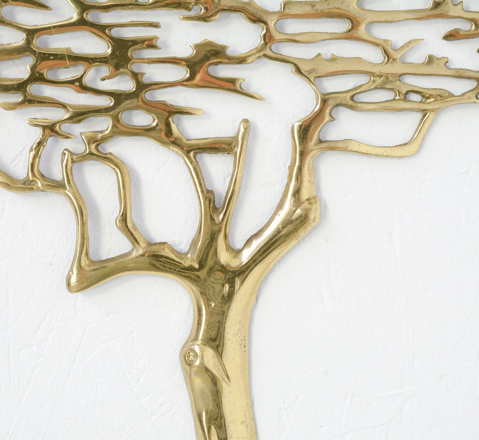 This polished brass wall sculpture, inspired by a Japanese Bonsai tree, is a nice example of decorative design of the 1970s.
This wall sculpture is in good vintage condition, with signs of age and use.