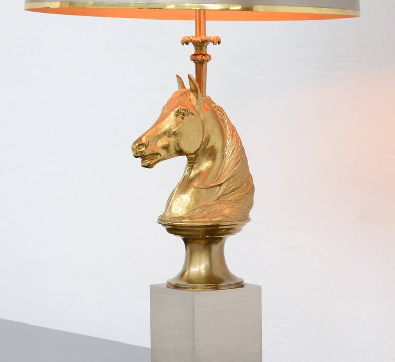 This very exclusive bronze and aluminium table lamp “Cheval” is designed and produced by the Maison Charles in Paris, in the 1970s, in the collection Charles Design Sculpture.
The lamp is signed, 
