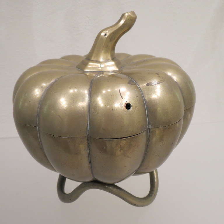 Chinese bronze pumpkin gourd shape box. Supposed to be a Chinese work out of the end of the 19th century. A nice eyecatcher which provides a useful function.
