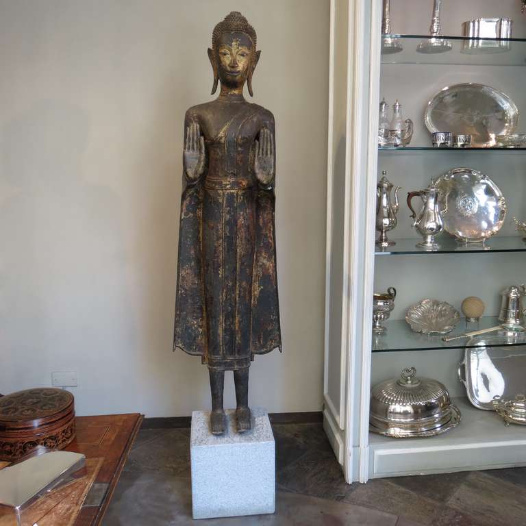 Important exceptionally large fine gilt bronze statue of a standing Buddha. The hands in the position of 