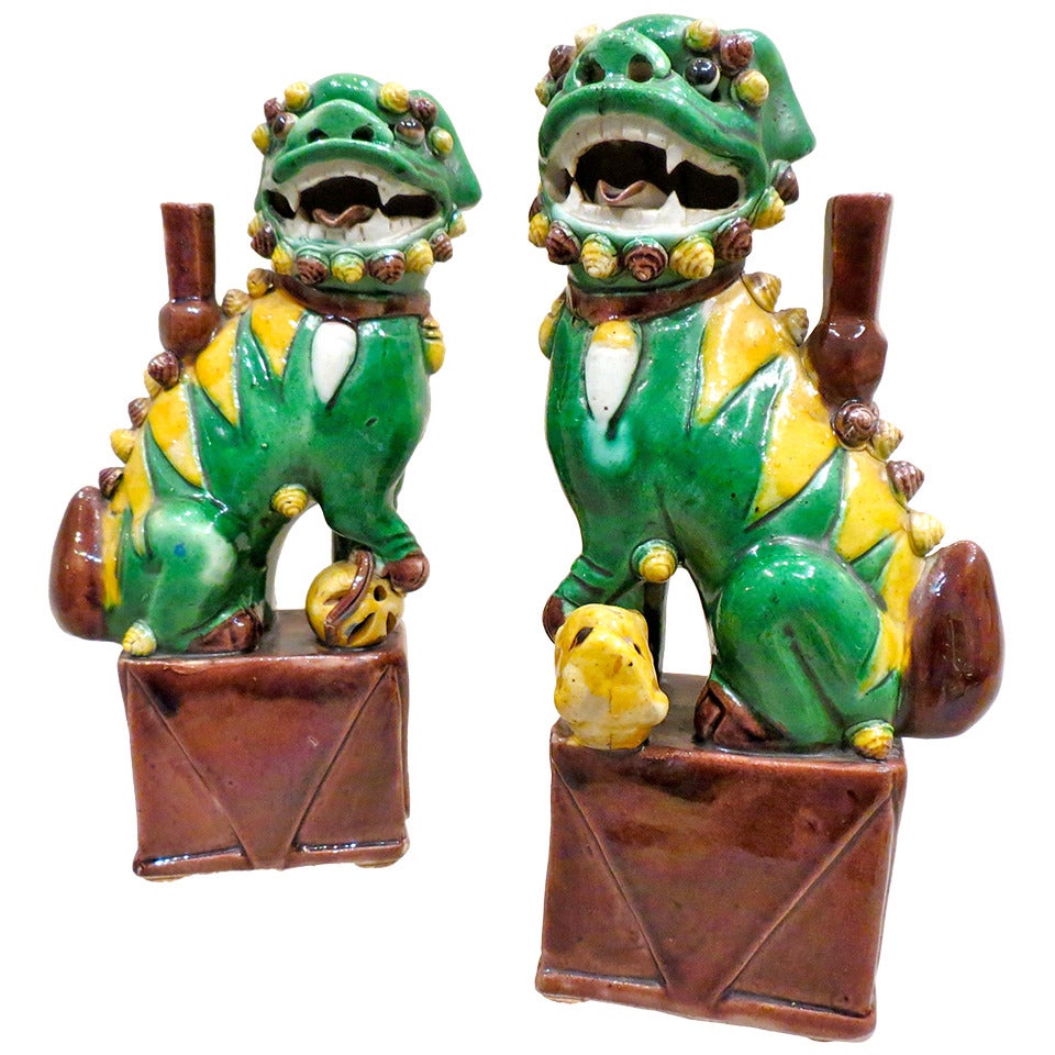 Pair of Famille Verte et Jaune Foo Dogs, Qing Dynasty For Sale