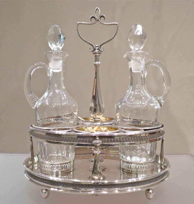 Exceptional antique French silver and crystal oil and vinegar cruet stand by ‘Maître Orfèvre’ (1784) François Picarol. An exquisite craftsmanship concentrating on the details and highlighting the very pure and elegant design, Paris, 1797-1798.