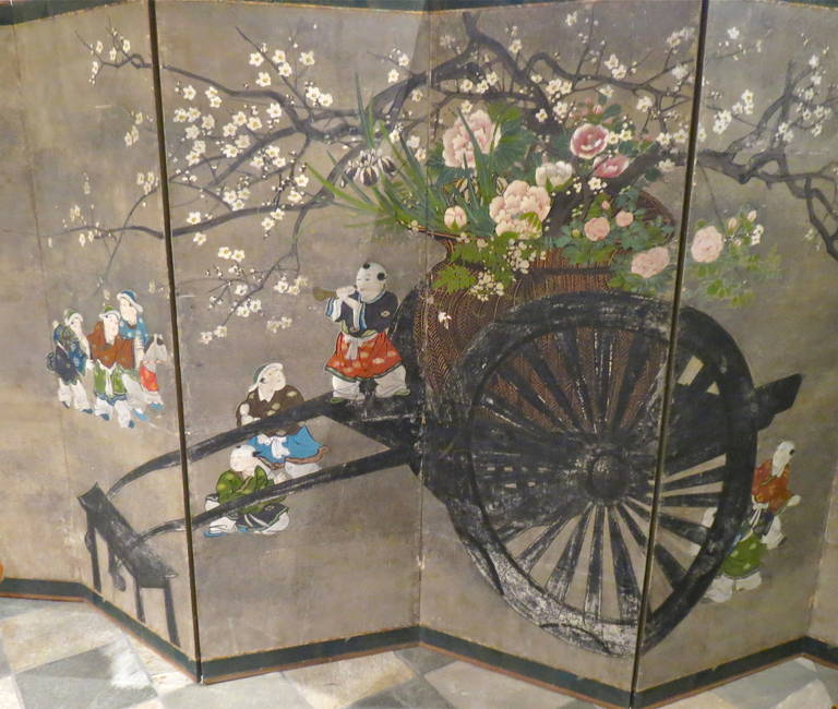 Large six-panel folding screen (byobu) depicting a flower cart with child's all around, painted on silk, Japan, circa 1880.

Dimensions: H = 174 cm, W = 367 cm, D = 2 cm.