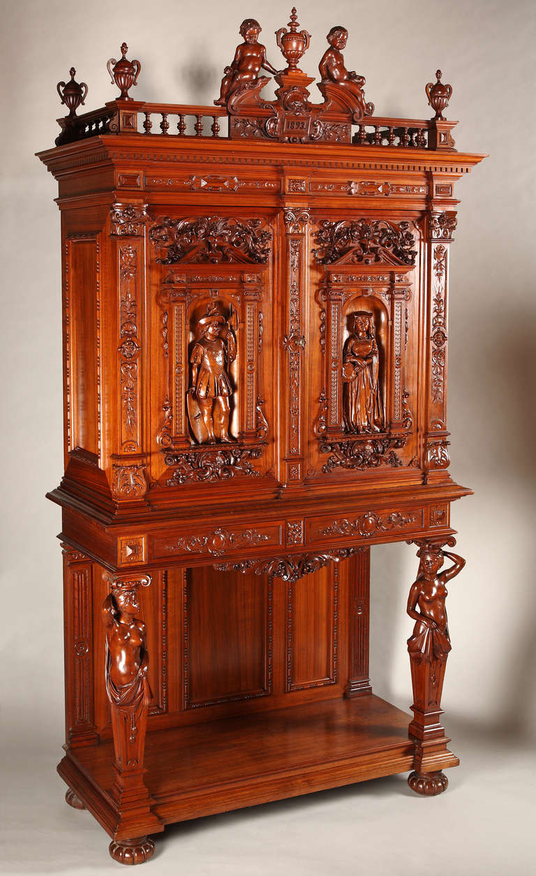 H.-A. Fourdinois
Cabinet-maker
(1830-1907)
attributed to

A Renaissance style wood carved cabinet

France
1893
Height : 240 cm (94 1/2 in.) ; Width : 124 cm (48 3/4 in.) ; Depth : 56 cm (22 in.)

A walnut cupboard, elaborately carved