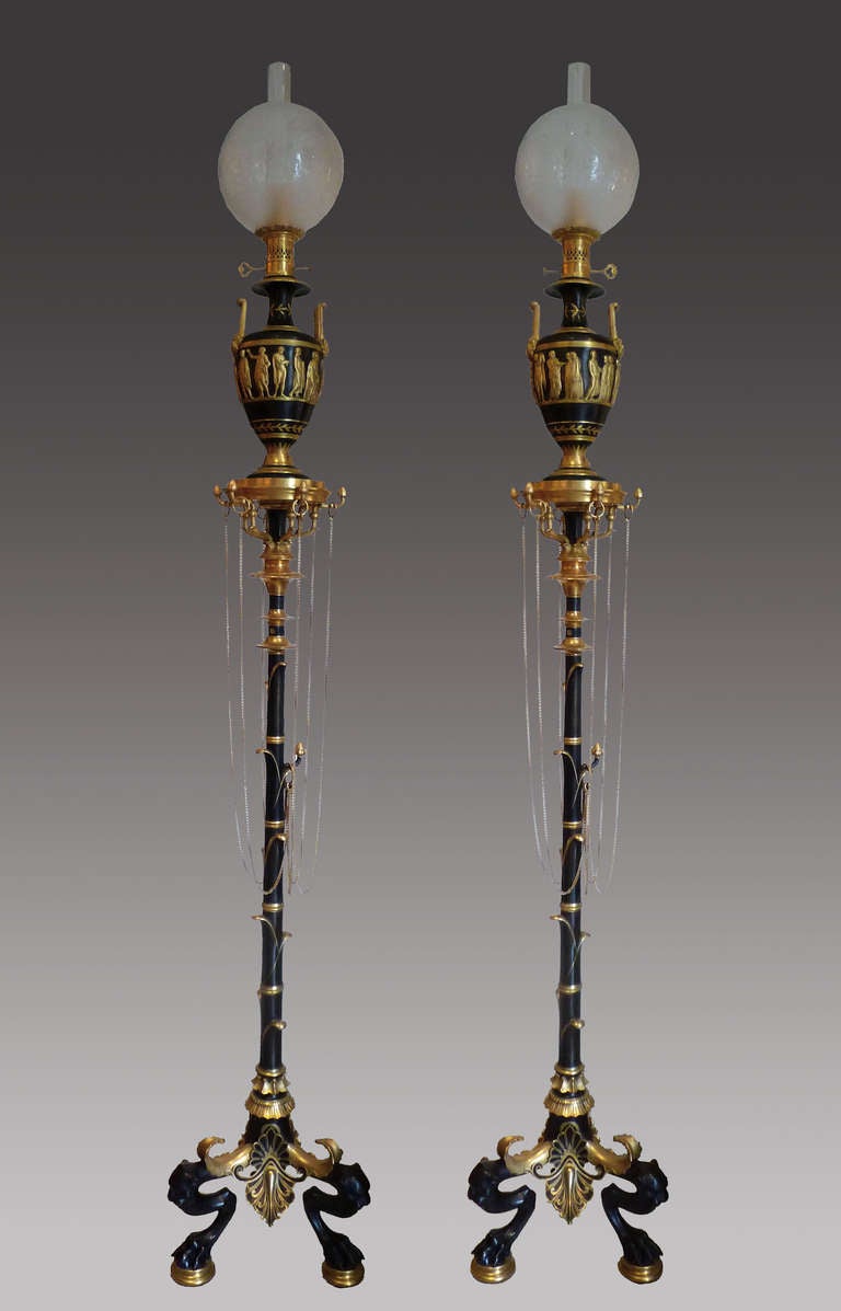 F. Barbedienne
bronze-caster
(1810-1892)
and
H. Cahieux
sculptor-ornemanist
(1825-1854).

Pair of neo-Pompeian floor lamps.
 
Signed F. Barbedienne,

France,
circa 1855.
Measures: Height 202 cm (79 1/2 in.); base diameter 35 cm (13 3/4