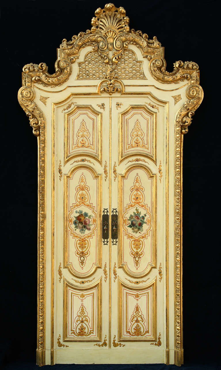 A set of four Venitian palace double doors

Italy
Late 19th century
Height : 318 cm (10 1/2 ft.) ; Width : 164 cm (5 1/3 ft.)

Exceptional set of two double doors and two false double doors, made in lacquered and gilded wood, decorated with