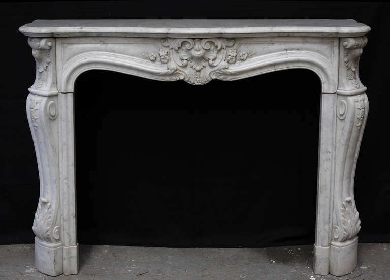 A Louis XV style chimney mantelpiece.

France.
circa 1880.

Height : 108 cm (42 1/2 in.) ; Width : 144 cm (56 2/3 in.) ; Depth : 44 cm (17 1/3 in.).
Opening – Height : 85/90 cm (33 1/2/35 1/2 in.) ; Width : 102 cm (40 in.).

A fine large