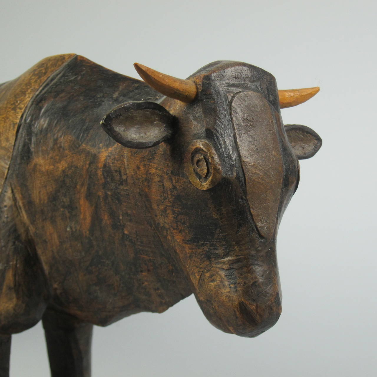 A large 19th-early 20th century North Nguni carving of a bull. 

The ancestors of Nguni cattle were brought by the Xhosa, Zulu and Swazi people, during their migration to Southern Africa between 600 and 1400 AD. Since then, these animals have