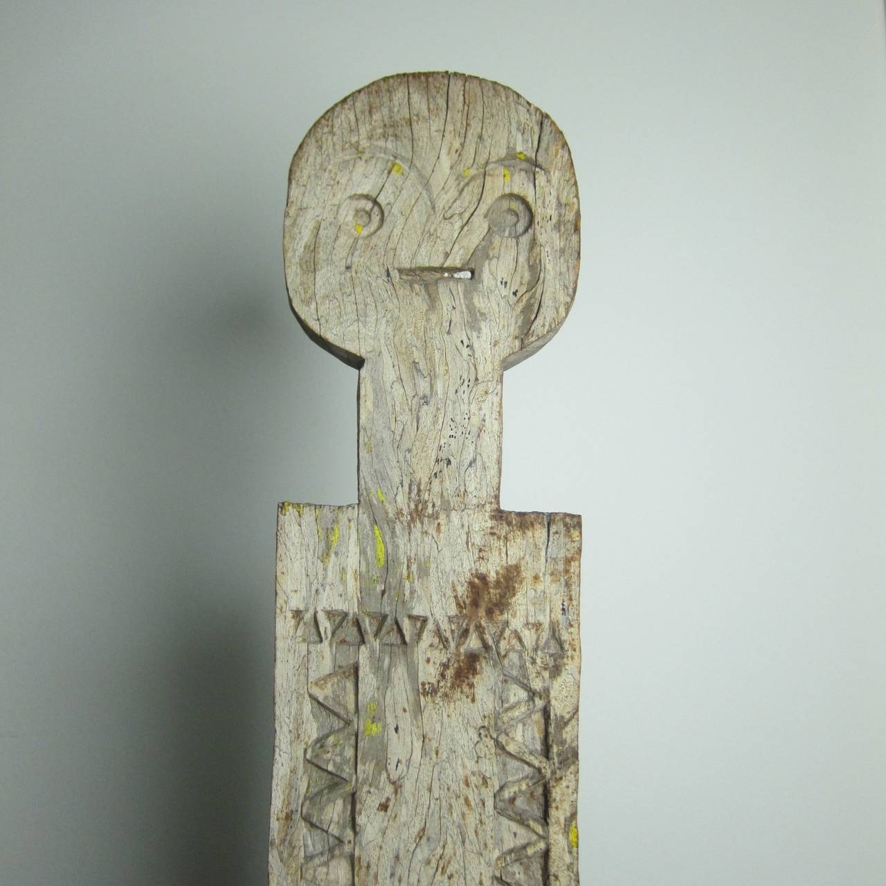 A highly abstract wooden post from Kenya.

The Giryama people of the Kenyan coast are known for their long standing tradition of carved wooden mortuary posts. The grave posts, called kikangu, serve a number of functions within Giryama life. In the