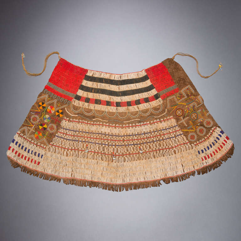 Elaborately beaded and painstakingly constructed, this type of hide skirt was created by young Iraqw girls as part of their initiation into the secret women's society known as Marmo. Refashioned by its wearer from hide that initially served as a