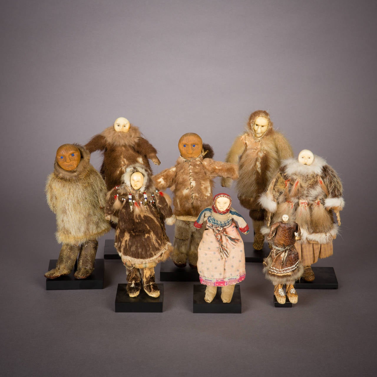 Young girls in Alaska, like girls in countless cultures the world over, played with dolls. Yup'ik girls usually owned a number of dolls made for them by her fathers, commonly in sets of five: Father, mother, daughter, son, and baby. As seen in this