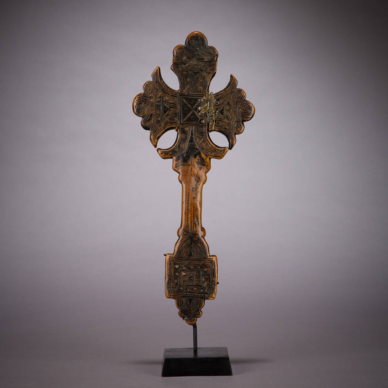 ‘Horn of Lamb of God’ wooden hand cross, circa 17 century, Northern Ethiopia

Ethiopian hand crosses are coveted by collectors of medieval art, religious art and tribal art for their beauty and variety of forms.

Ethiopia was probably the second