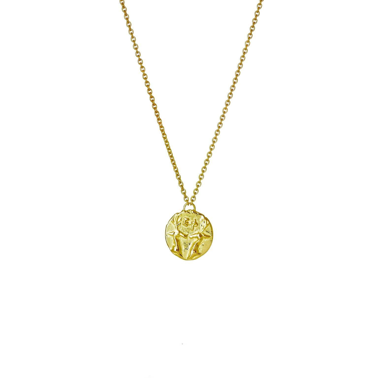 The Melissae necklace features a beautifully detailed bee pendant in yellow gold, which hangs on a fine trace chain. On the reverse side are two stag's heads facing one another. Both are symbols of Artemis the Greek goddess of hunting and the