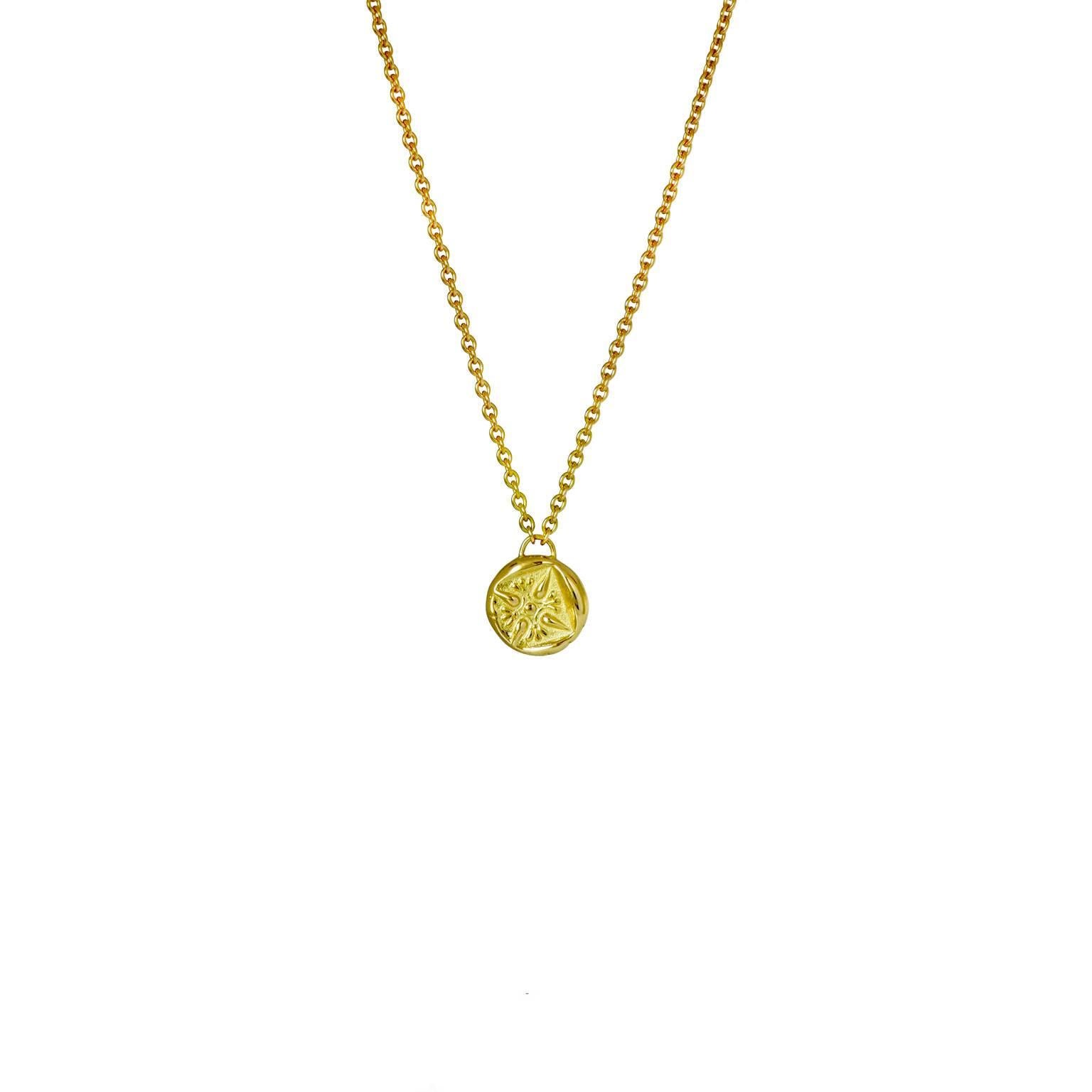 Feel majestic with our beautiful roaring yellow gold lion necklace. The small intricate pendant hangs on a fine trace chain and features a stellate pattern in an incuse square on it's reverse side. 

The first of Heracles' twelve labours, was to