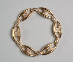 Mauboussin Bracelet jonc à chaîne en or et diamants, c. 1965