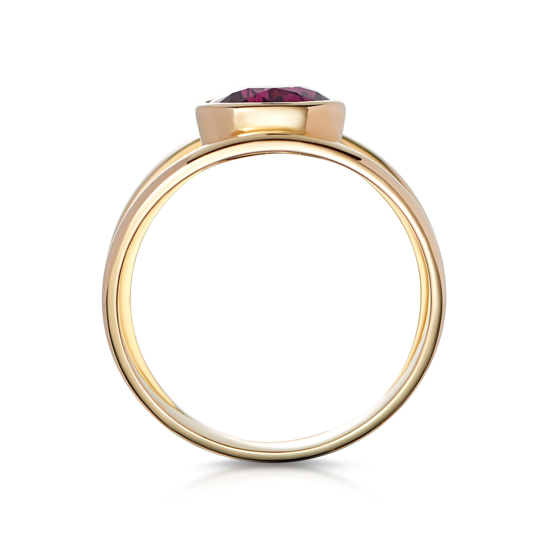 Magical Spinels. Often mistaken for Rubies, Spinels have been favoured for centuries by Mughal Emperors, Kings and Queens, even the British Imperial State Crown has one. 

This modern and elegant ring is timeless. The Spinel has excellent lustre and