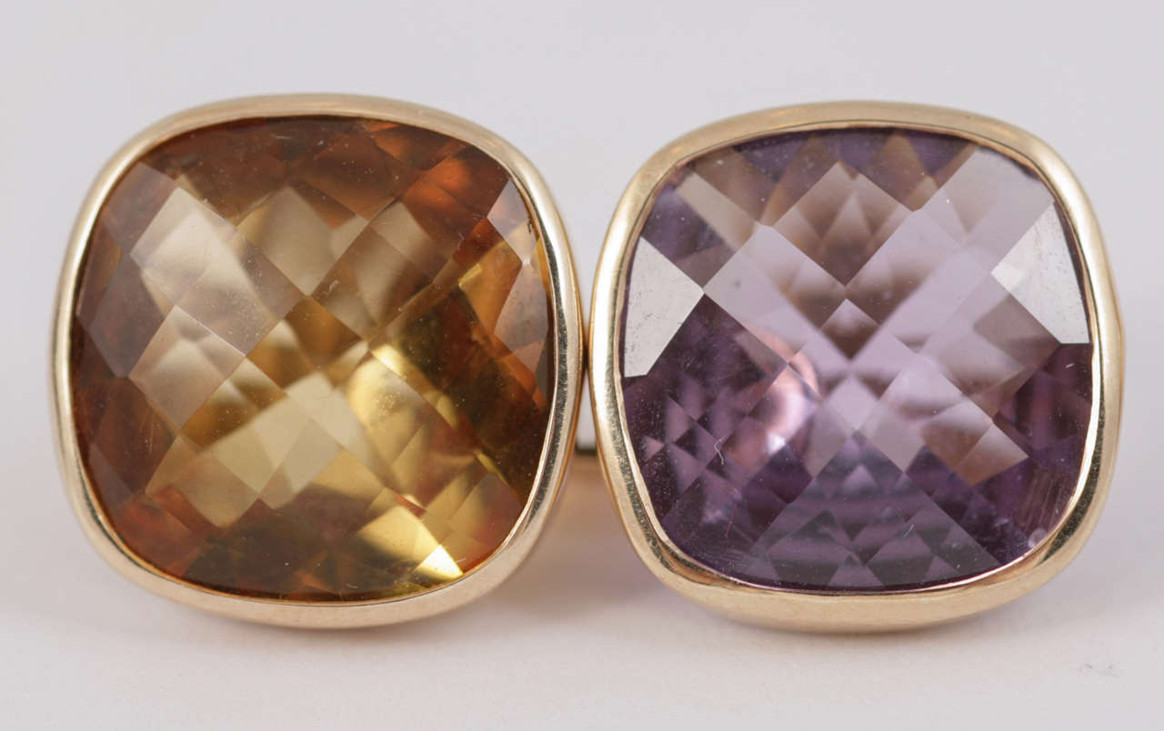 Pair of gold mounted quartz topaz amethyst cufflinks, faceted underneath, circa 1930.