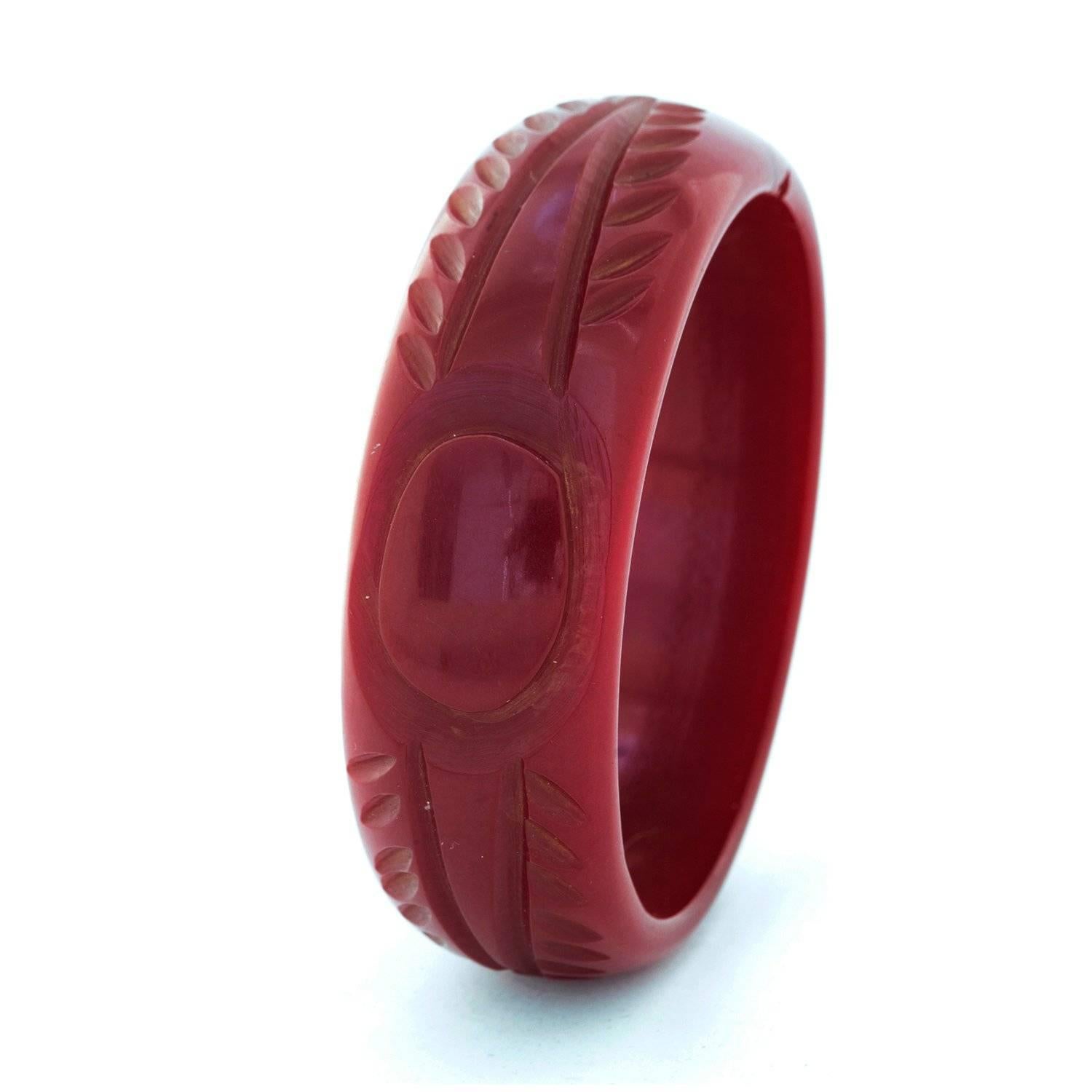 Women's Art Deco Deep Cherry Red Hand-Carved Bakelite Bangle For Sale