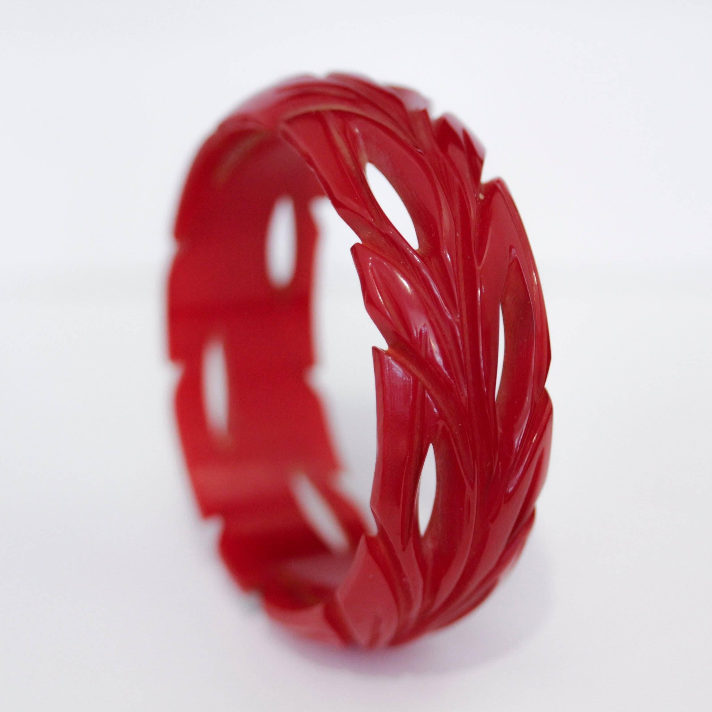 Women's Art Deco Cherry Red Bakelite Bangle, Deep Leaf Carvings and Cut-Outs from Bangle For Sale
