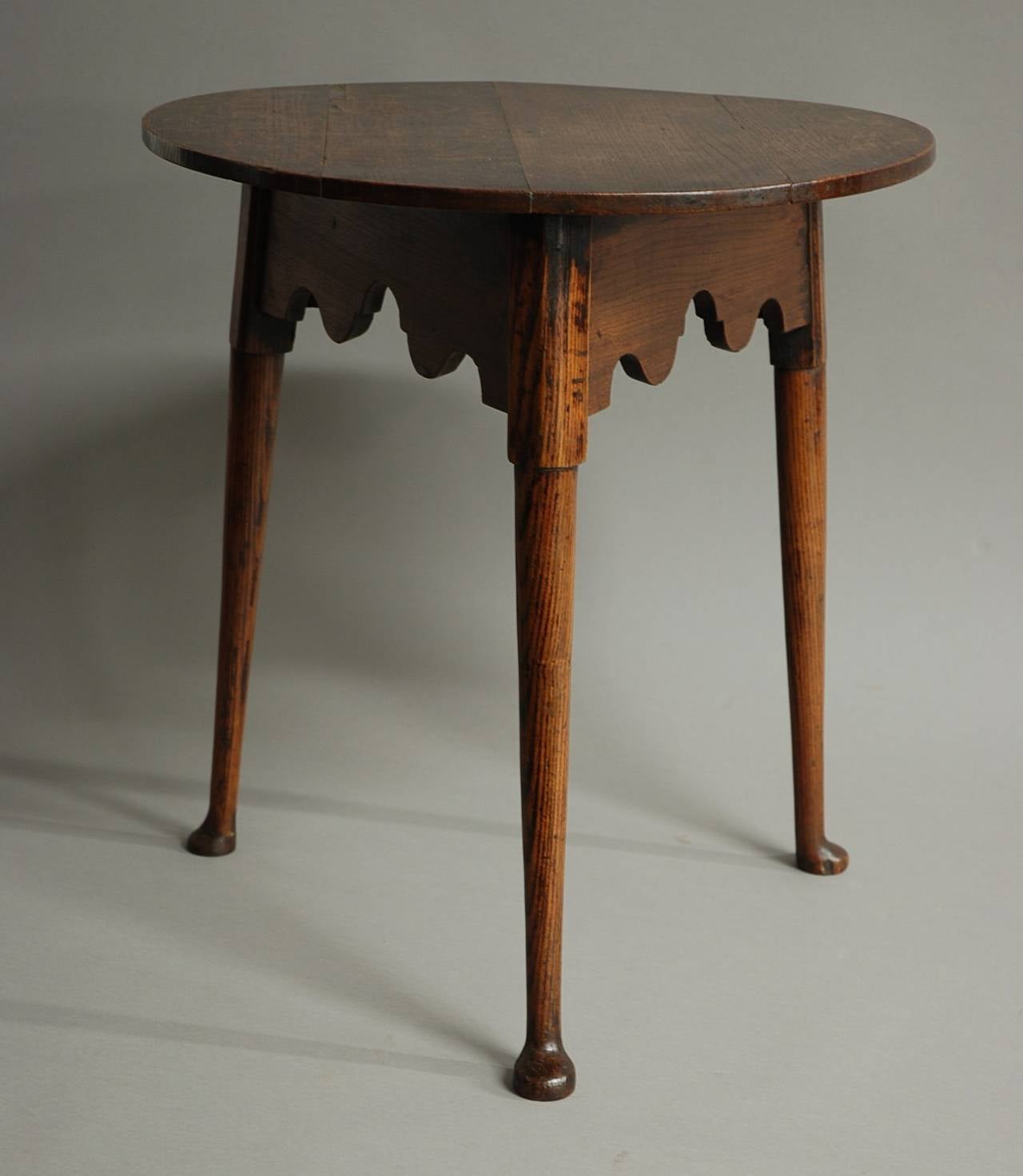 A rare late 18th century oak & ash cricket table of superb patina (colour) and sophisticated design.

This table has a super patina to the oak top with the typical 'cricket' table design of a three legged base with outswept turned legs and pad