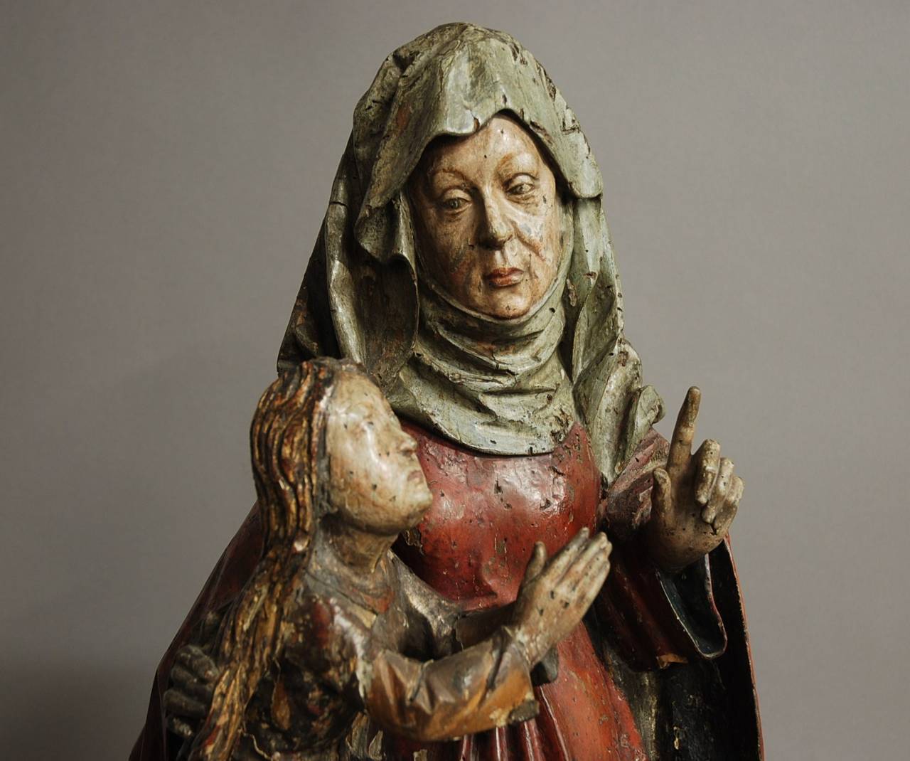 A polychrome, gilt & silver leaf limewood figure 'The Tuition of the Virgin' - Circle of Daniel Mauch (1477-1540)

It is likely that due to the size of this sculpture this would probably have been part of a Mariological cycle on a High altar.
