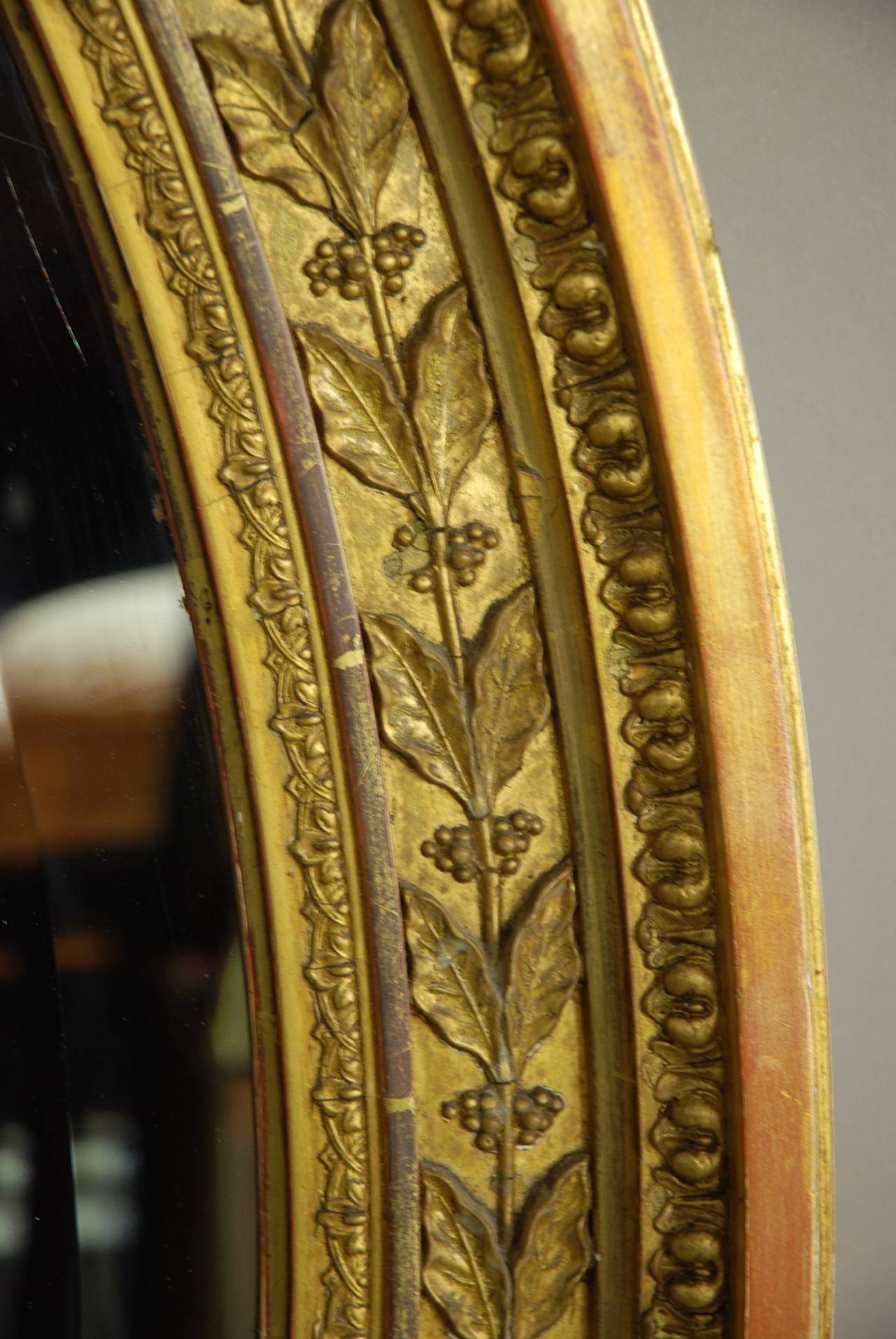 19th Century Late Regency Large Oval Gilded Mirror