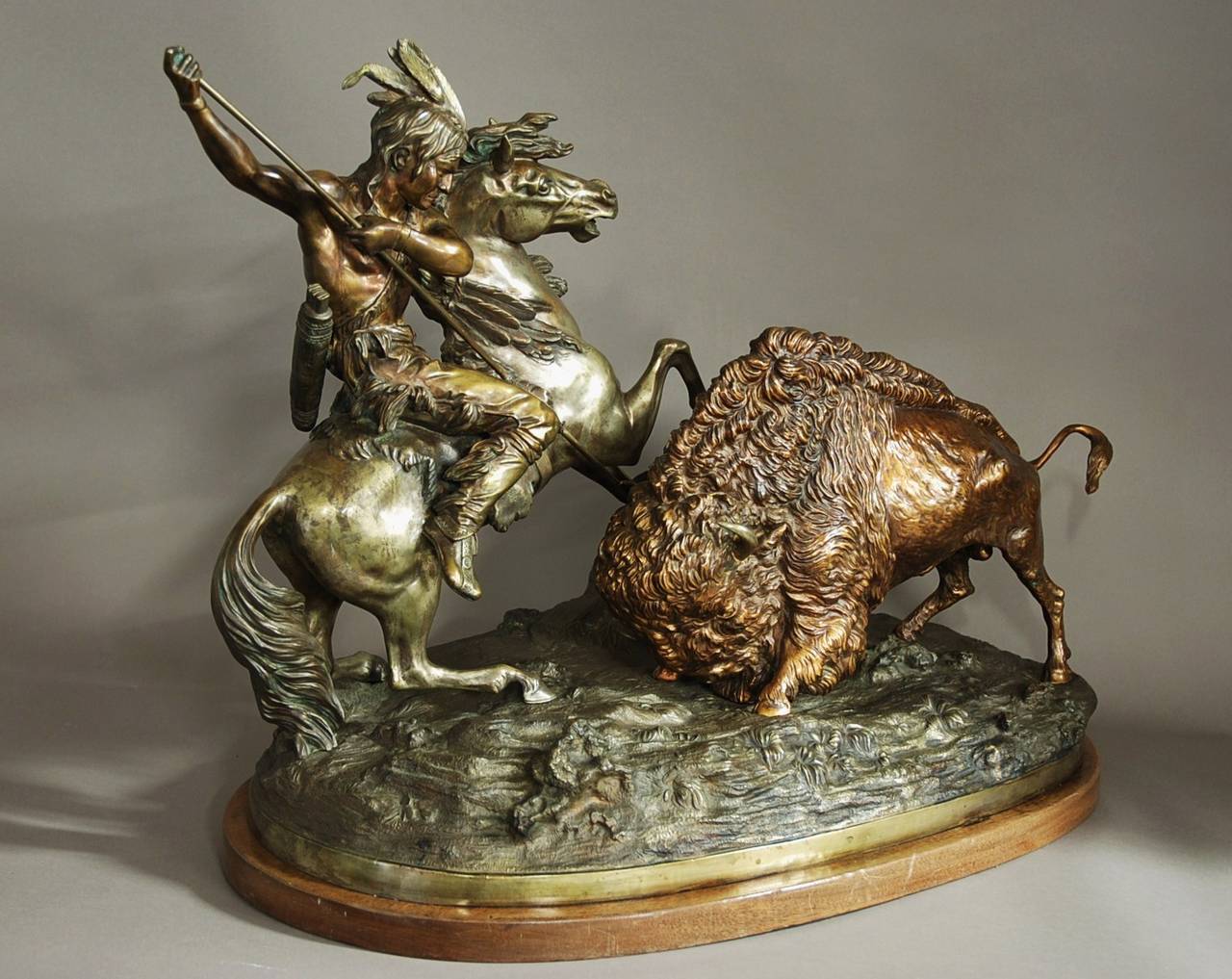 A large, fine quality bronze figure of 'The Buffalo Hunt' by Theodore Baur (1835-1894).

This bronze is a re-strike of superb quality from the original figure which was produced between 1876-1886 and depicts a native American on horseback holding