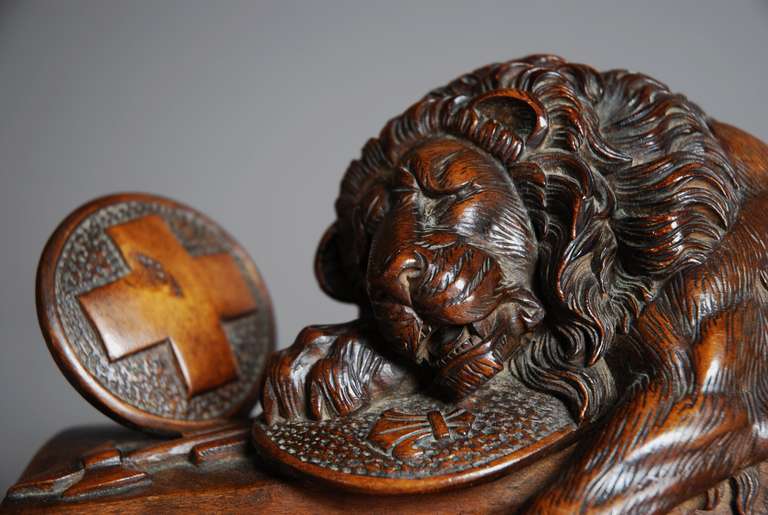 A fine quality late 19th Black Forest century linden wood carving of a lion, depicting the Lion of Luzern. 

This carving is based on the stone lion monument in Luzern that is in memory of the Swiss Guard who fell in 1792 whilst protecting the