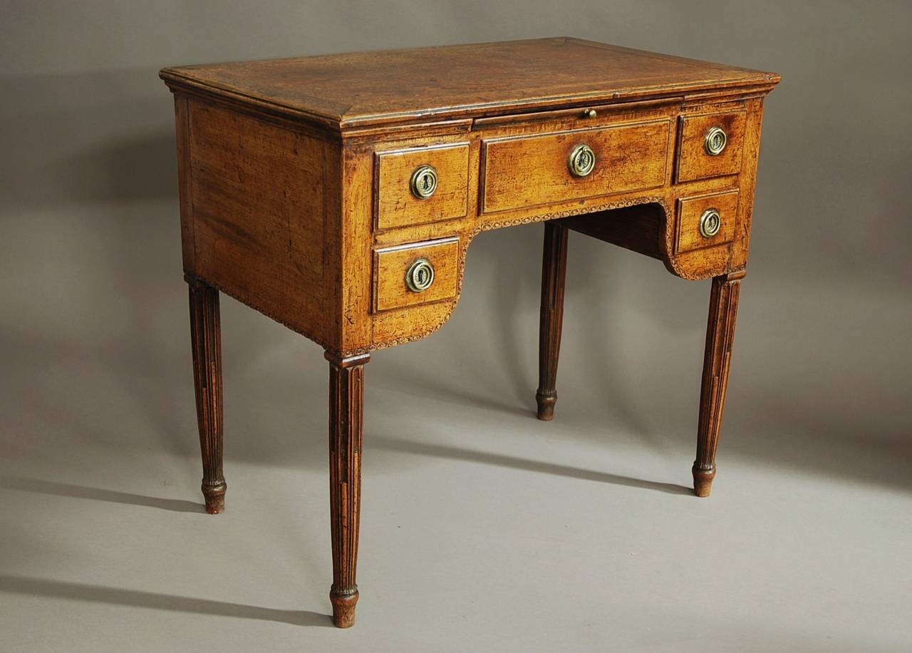 A mid/late 18th century Continental (possibly Dutch) walnut freestanding desk/table.

The top consists of a solid walnut top with moulded edge with an integrated brush and slide (ideal for using a laptop or tablet if used as a desk).

The table