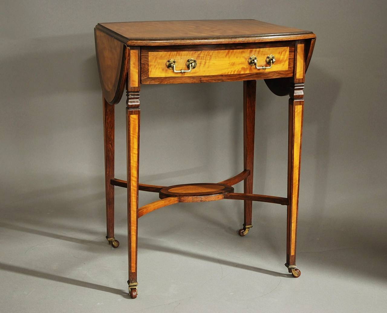 English Edwardian satinwood & rosewood oval pembroke table