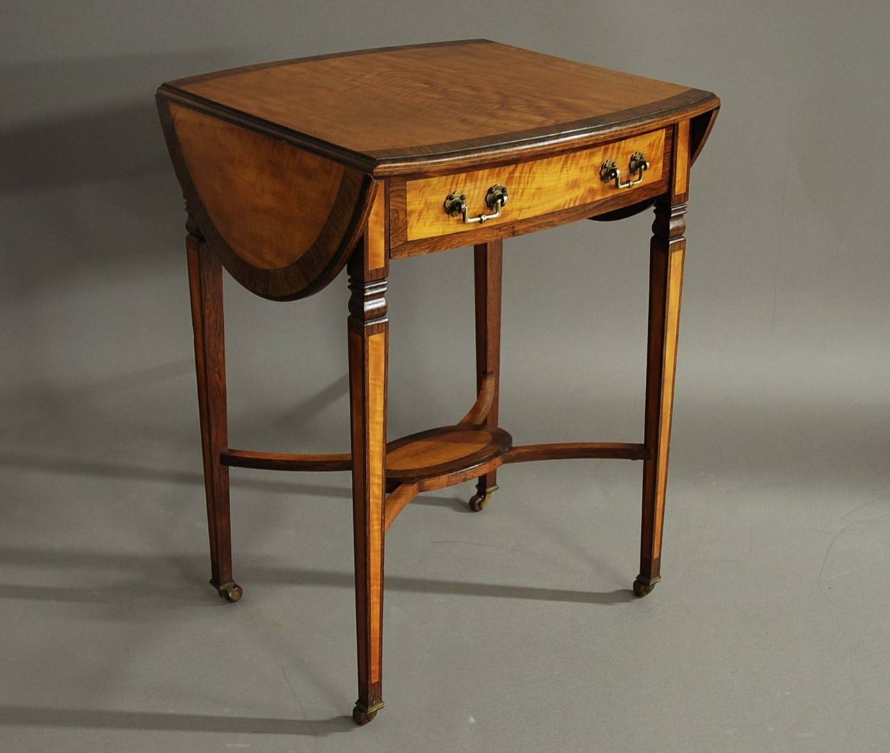 Edwardian satinwood & rosewood oval pembroke table 1