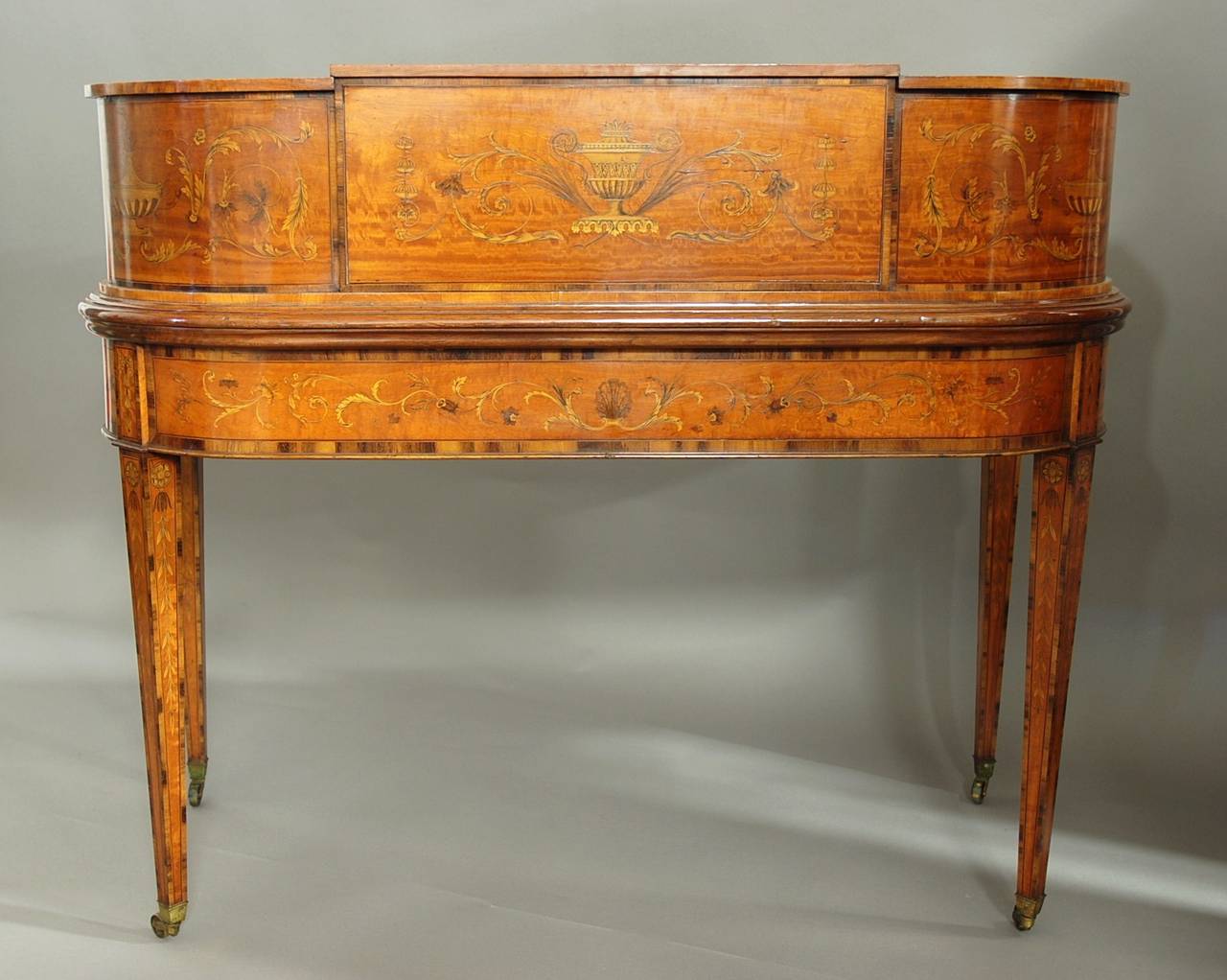 English Exhibition quality satinwood inlaid Carlton House desk in the Classical form