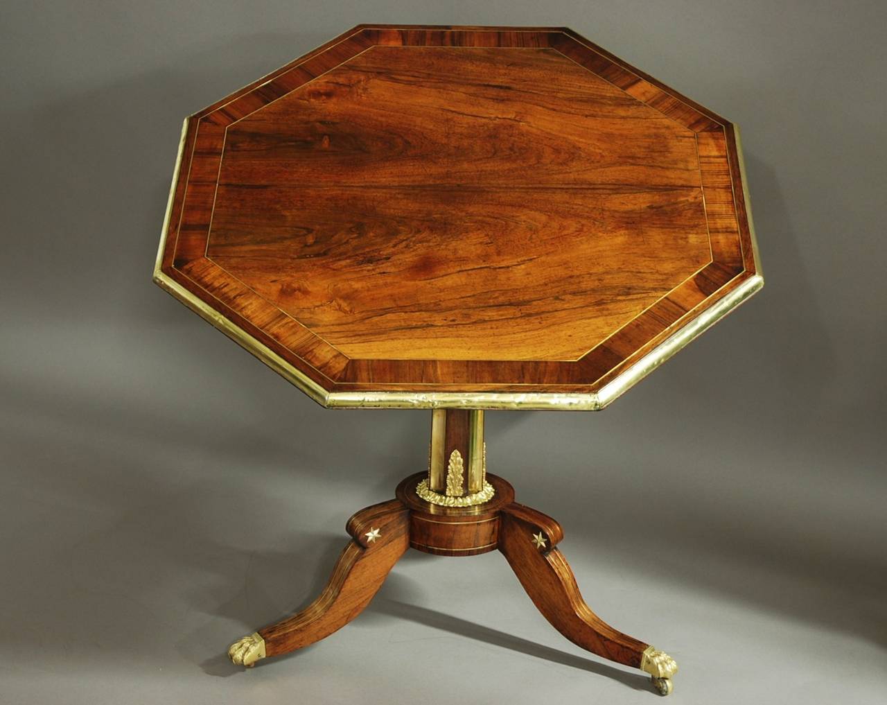 A rare early 19th century Regency tilt top rosewood centre table of octagonal form.

This table has a sophisticated design, has a superb patina (colour) and is in very good condition.
 
The table consists of mirrored rosewood veneers to the top