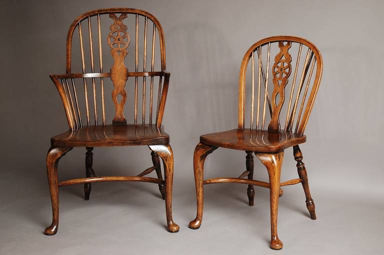 A good set of eight ash & beech wheelback windsor chairs with cabriole leg.

This set comprises of two carver and six single chairs to match.

The backs and legs are made of beech and the seats are ash.

The front legs are of cabriole design,