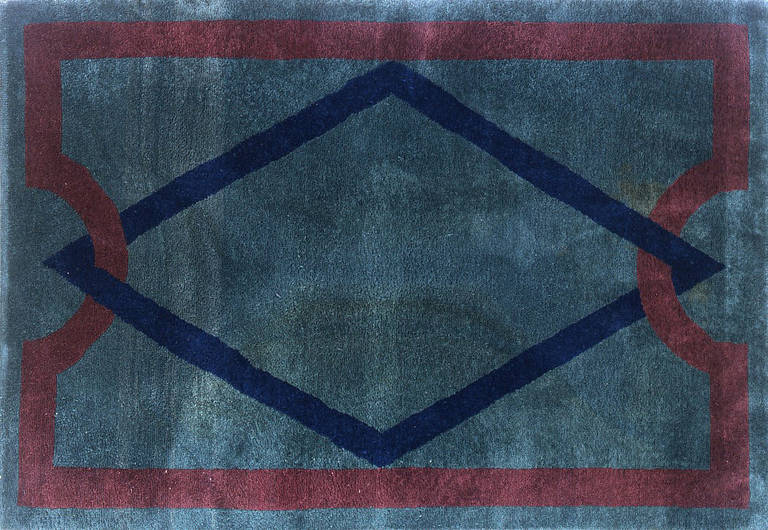 Wool rug with geometric neoclassical designs, dark red and blue on a green ground.
Yvonne Brunhammer “André Arbus,” Ed Norma, Paris 1996, p. 310, watercolor, project for a cabinet, circa 1948-1950.