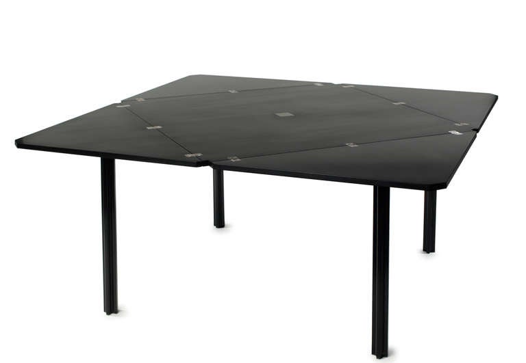 Model T92 envelope table designed by Eugenio Gerli and Mario Cristiani of Honduras Rosewood and Aluminum for Tecno. Signed Tecno.