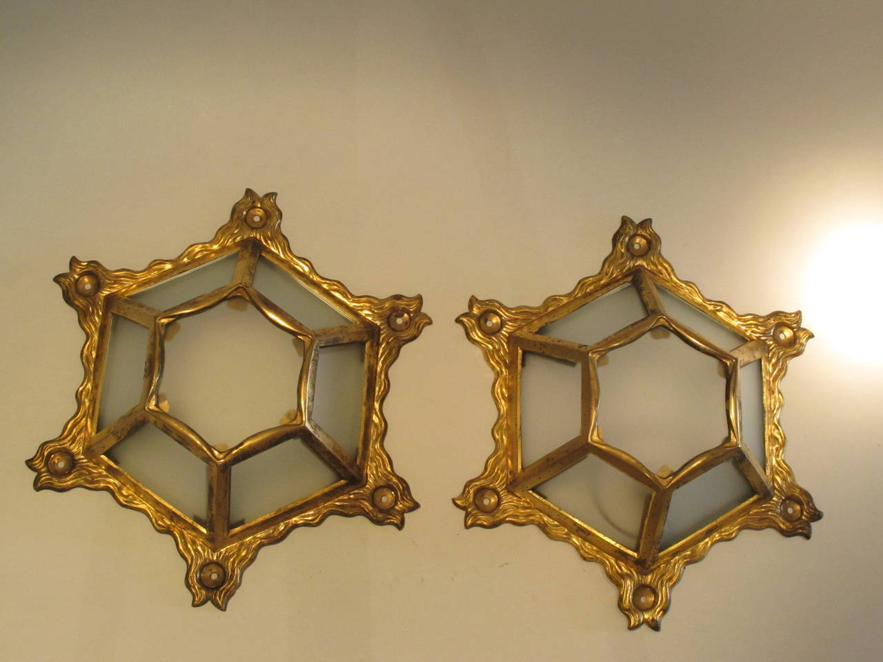 Pair of brass (gilded) ceiling lamps with sandblasted glass.