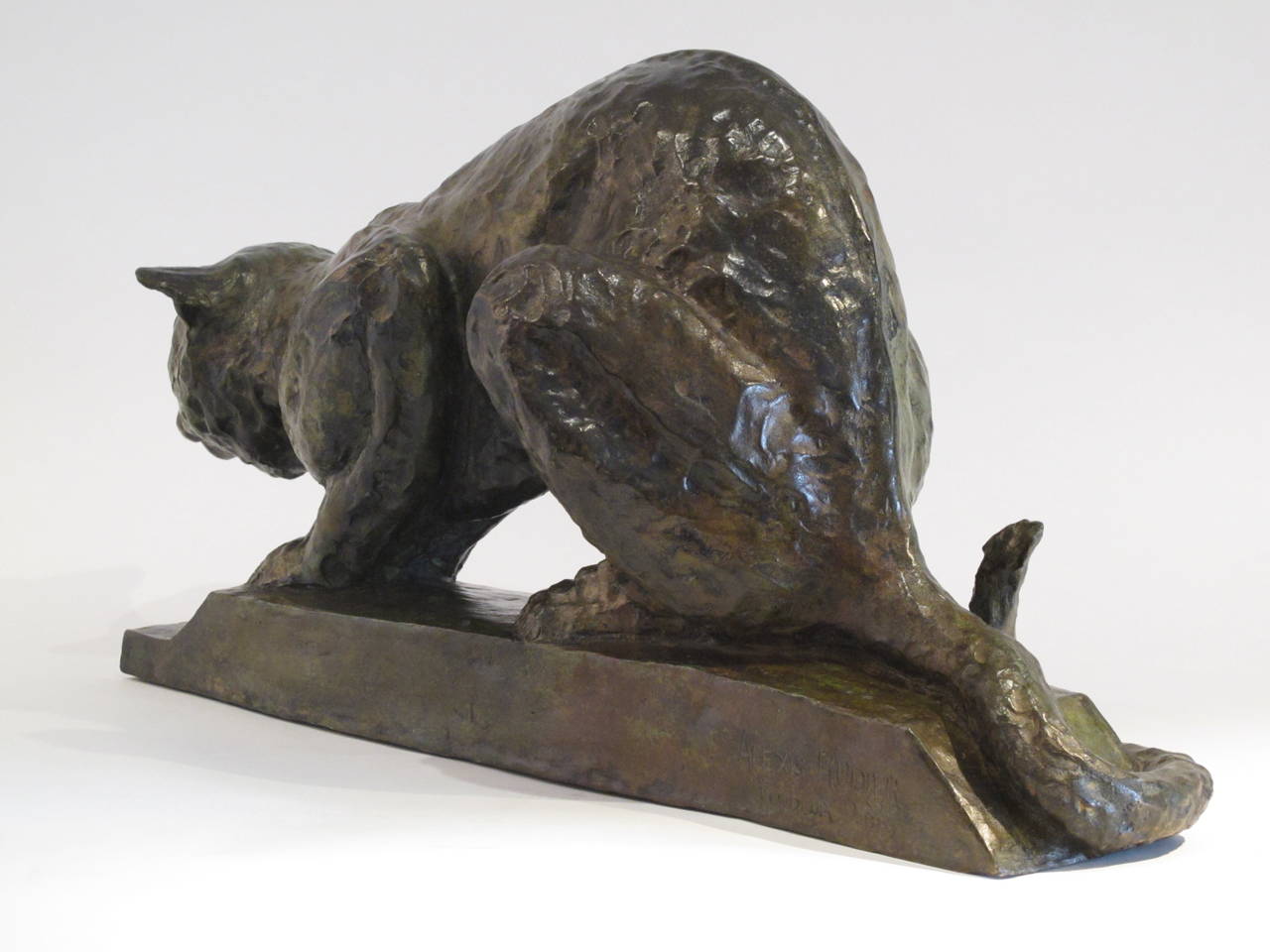 A rare, fine quality, late 19th century bronze model of a Cat / panther. This sculpture was cast in bronze by the lost wax process at the famous Alexis  Rudier Foundry, Paris circa 1890.
This cast has a medium green/ brown patina.