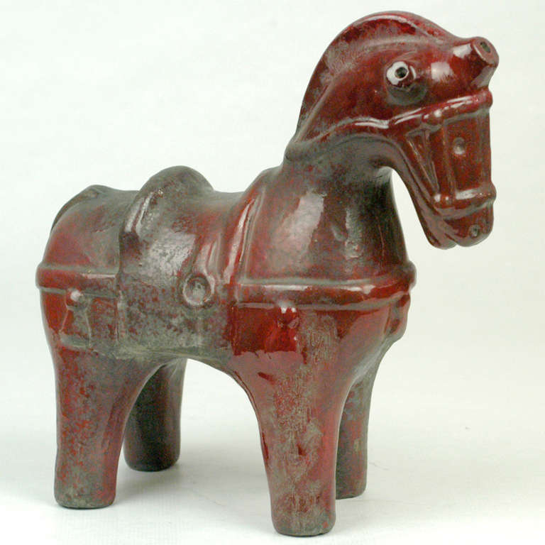 Amazing and rare red Version by Aldo Londi´s famous Horse of the 