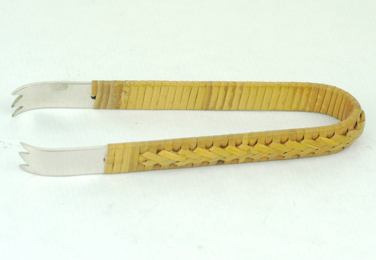 Amazing Austrian modernist ice cube pincer with wicker handles in excellent condition, signed Auböck.