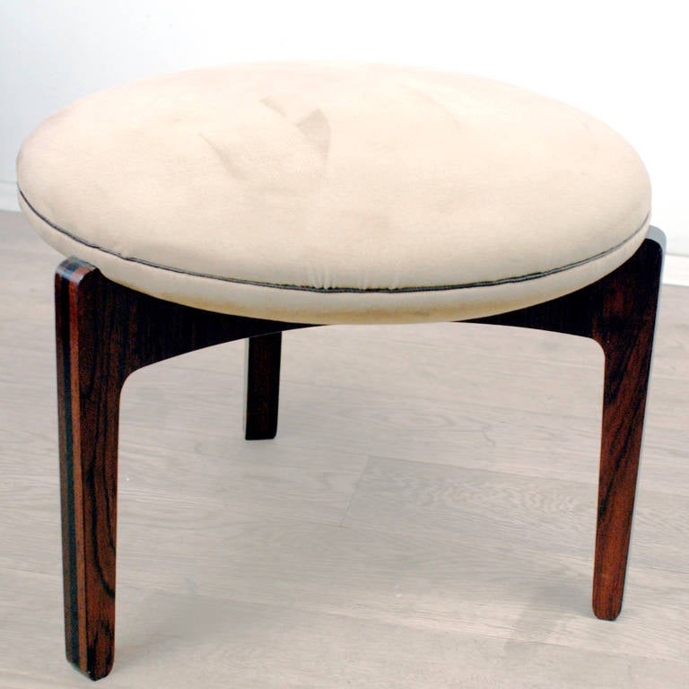 Circular three-legged rosewood stool with inlaid and beige Alcantara seat.
The excellent addition to every interior!